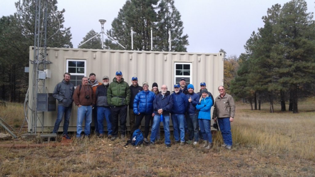 meeting members in front of office
