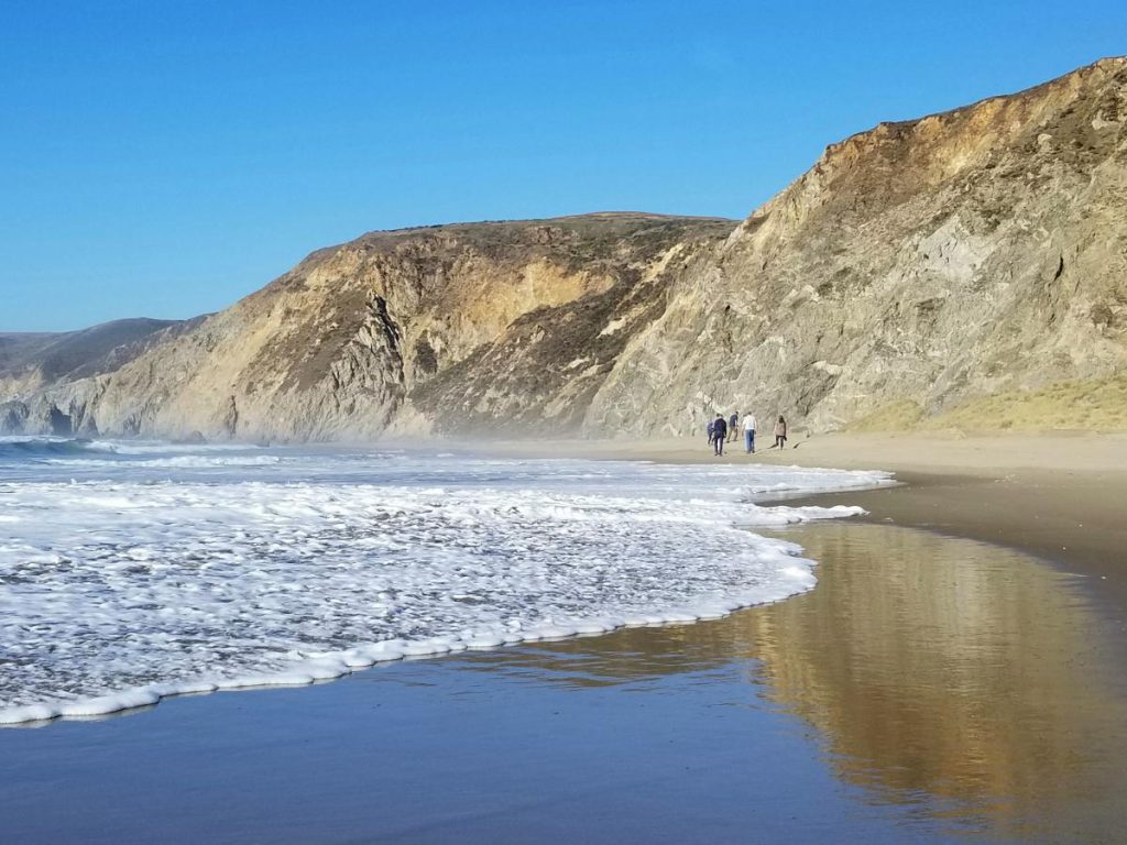 Wave rolling in on beach