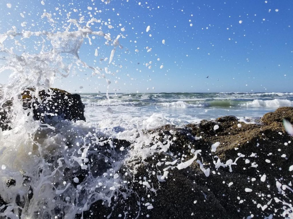 crashing wave on rocks