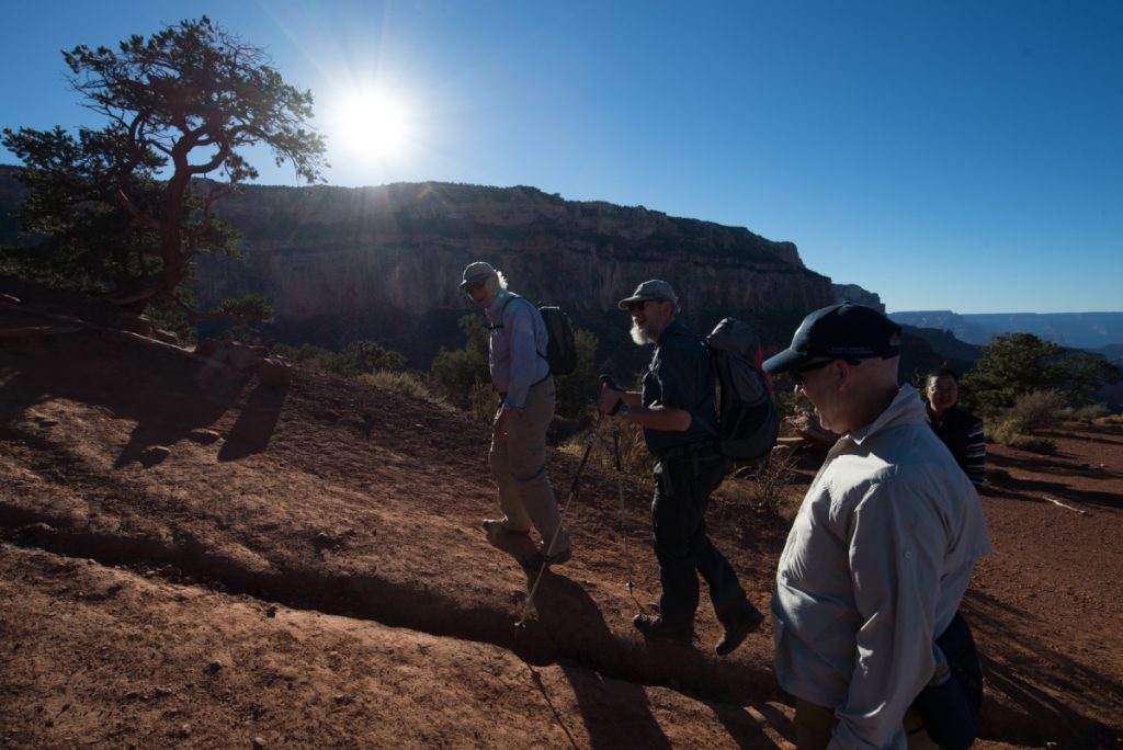 Group walking up to grand canyon