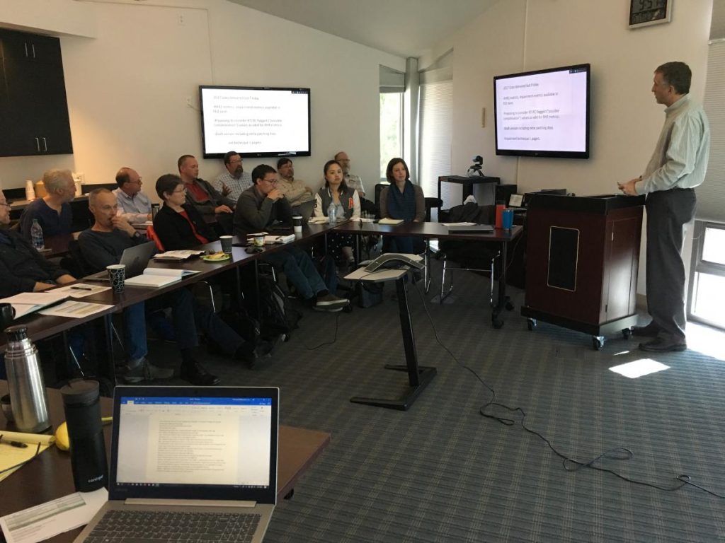 attendees listening to presentation