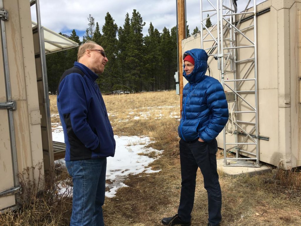 meeting attendees talking in nature