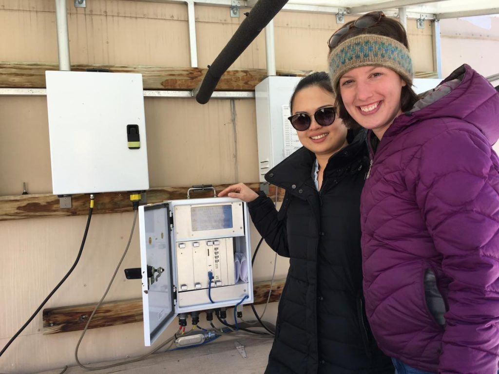 two attendees near monitoring equipment
