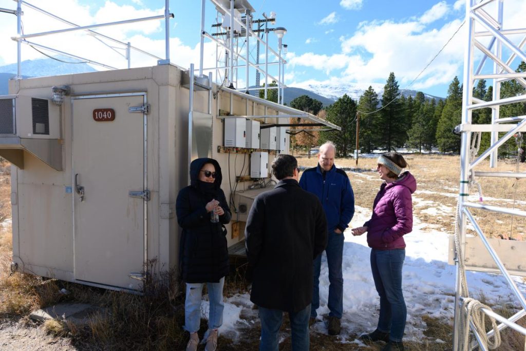 Attendees chatting in circle