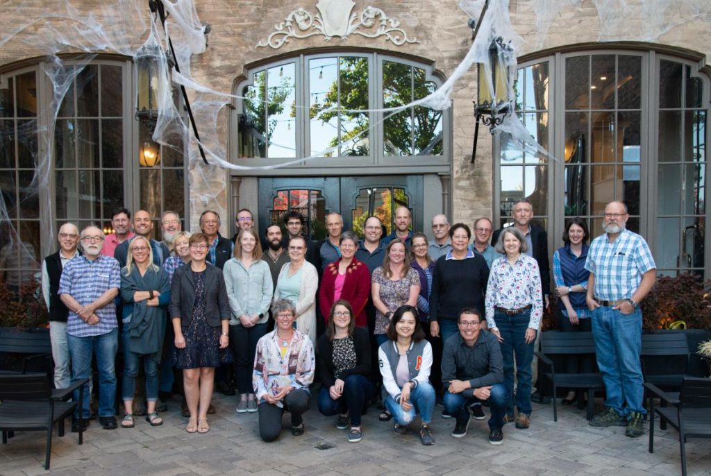 attendees outside meeting hall